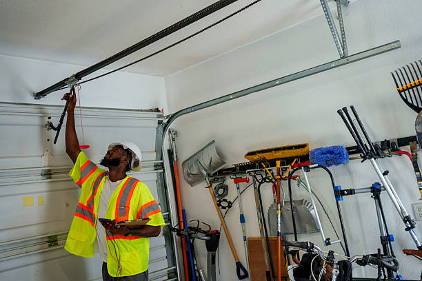Professional Garage Door Roller Replacement technician working in Michigan City, IN